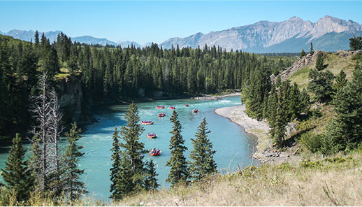 River with mountains in the background, showcasing the awe of nature