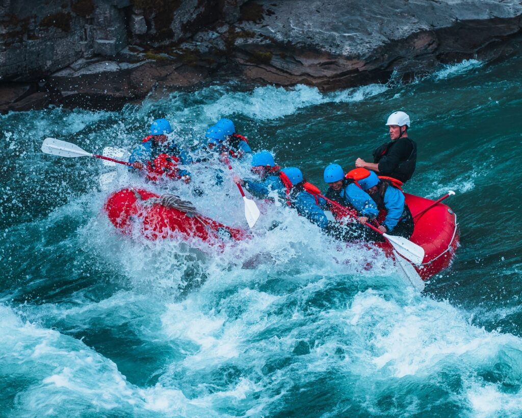 Red Raft powering through whitewater